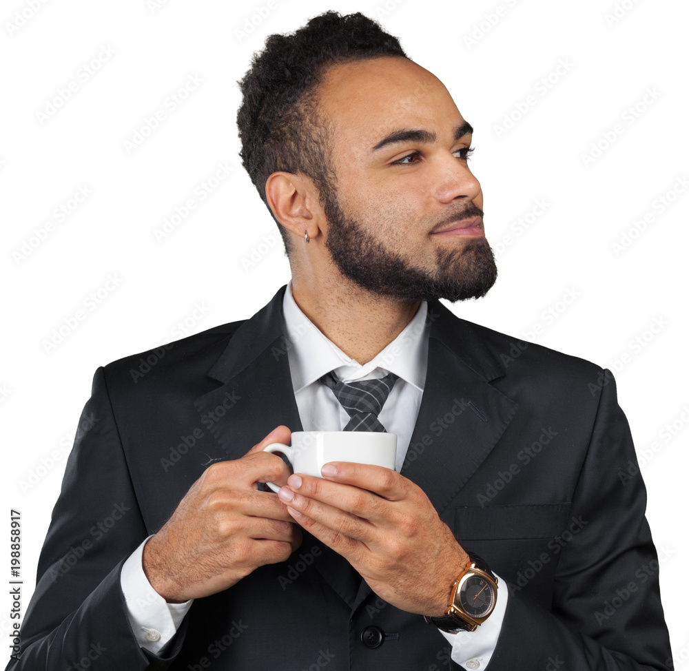 Portrait of a handsome businessman with a cup of coffee. Portrait of a handsome businessman with a cup of coffee.