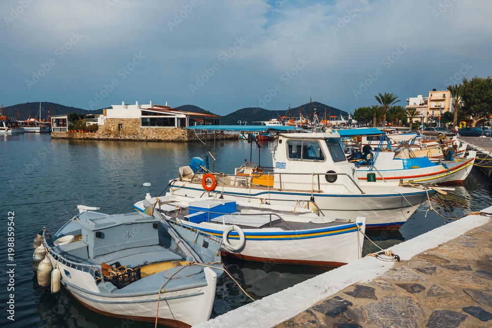  Ships and fishing boats in the harbor of Elounda, Crete, Greece