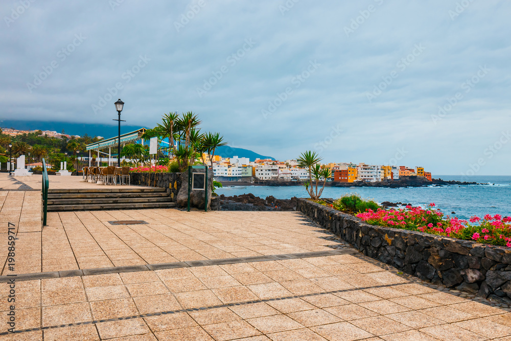Promenade and colorful houses of Punta Brava in Puerto de la Cruz, Tenerife Island, Spain