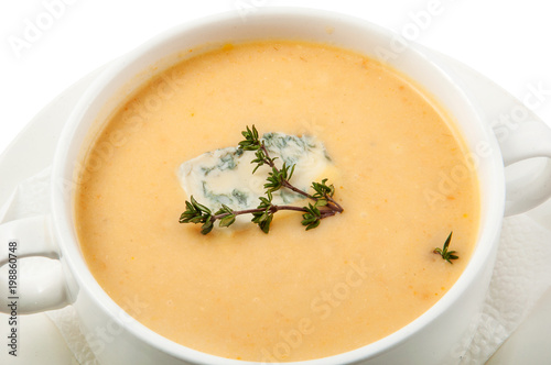 a plate of soup on a white background