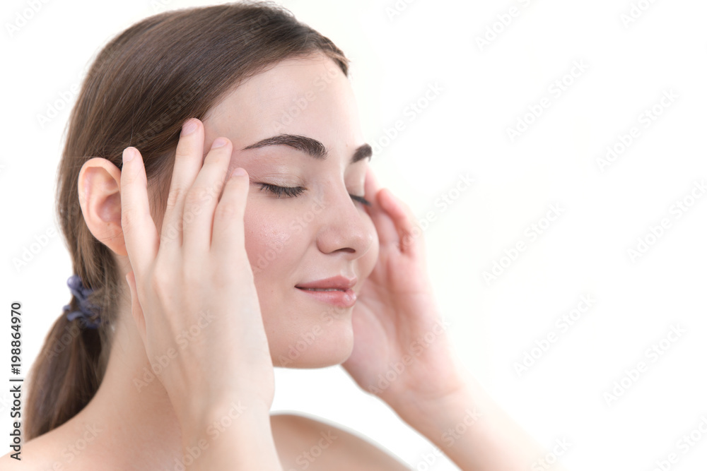 Beautiful women face spa treatment with hand massage for relax on white background with space for text Beautiful women face spa treatment with hand massage for relax on white background with space for text
