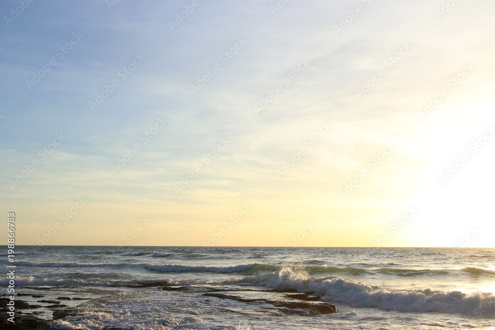 background of beach and sea at sunset colors. background of beach and sea at sunset colors.