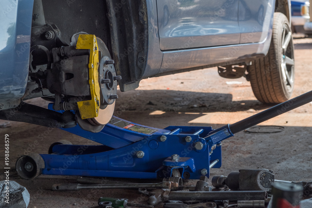 Fototapeta premium The wheel was removed for repair.