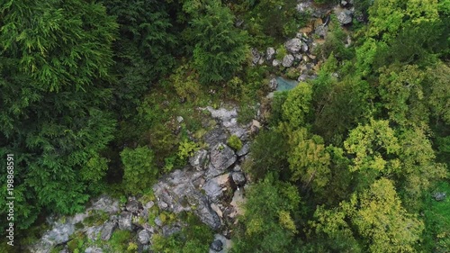 Flyover shot of dried up mountain river in the forest near Olympus in Greece