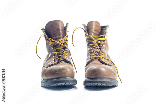 A pair of well worn Work Boots.