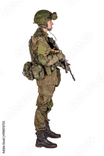 russian special forces soldier with rifle on dark background. army, military and people concept