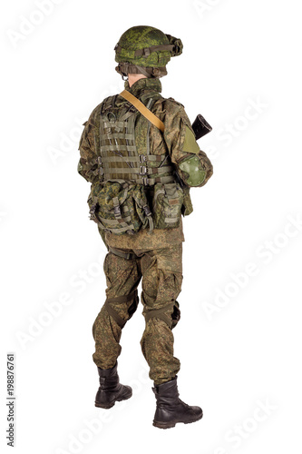 russian special forces soldier with rifle on dark background. army, military and people concept