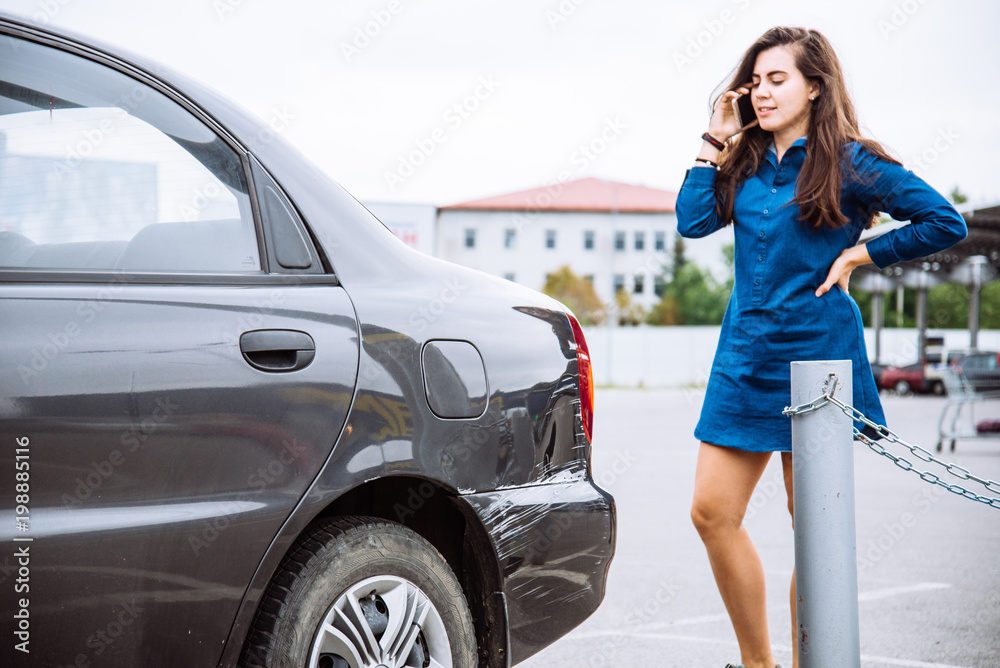 woman stand near scratched auto. call for help. car insurance woman stand near scratched auto. call for help. car insurance