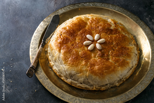 Chicken bastilla, Moroccan layered pie, top view copyspace