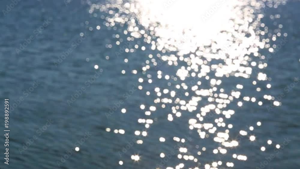 Beautiful view of blue shiny blurry sea. Sun reflection on calm surface of water. Slow motion hd video footage. Beautiful view of blue shiny blurry sea. Sun reflection on calm surface of water. Slow motion hd video footage.