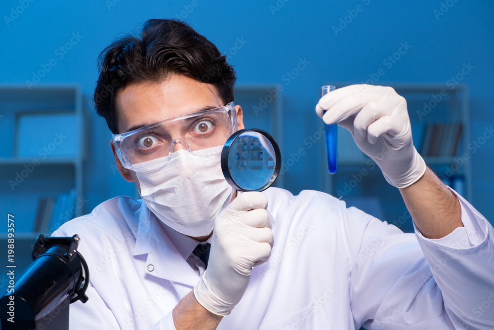 Chemistry assistant working in the chemical lab Chemistry assistant working in the chemical lab