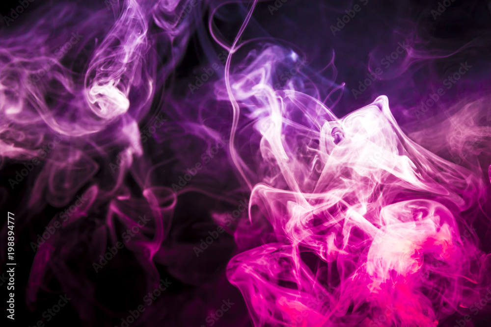Fototapeta premium Colored smoke on black background