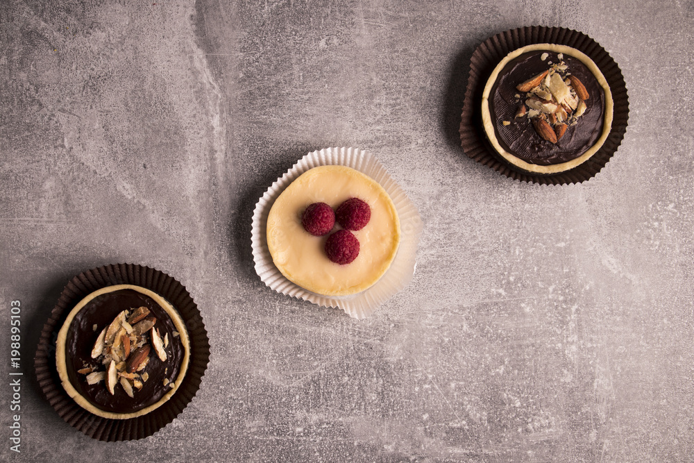 Mini tarts on rustic grey background