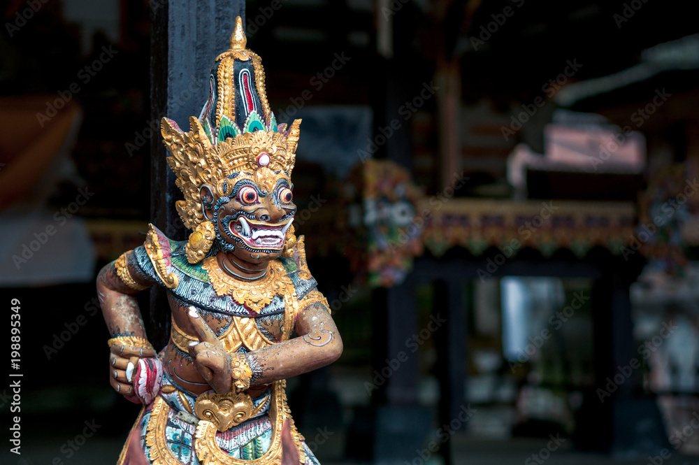 Carved statue of balinese guardian