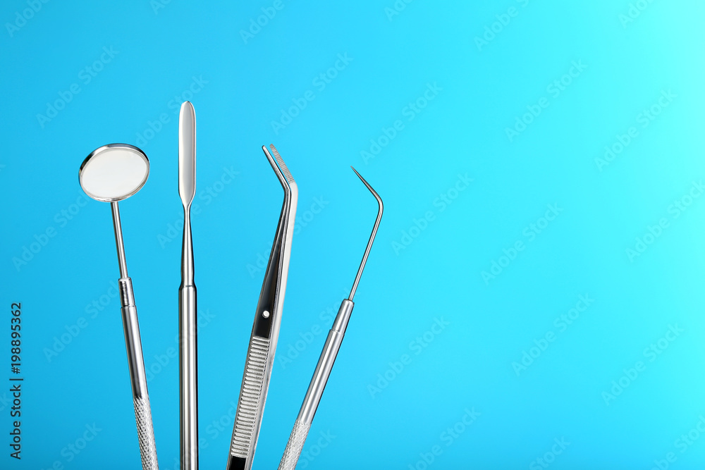 Dental equipment on blue background Dental equipment on blue background