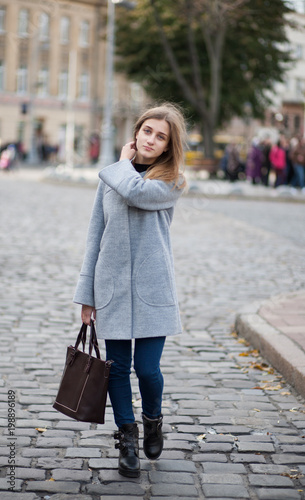 Portrait young businesswomen in gray