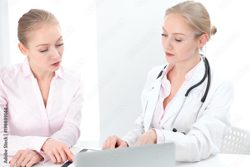 Doctor and patient during personal consulting in hospital Doctor and patient during personal consulting in hospital