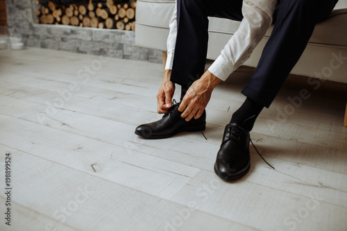 man preparing for wedding. shoes