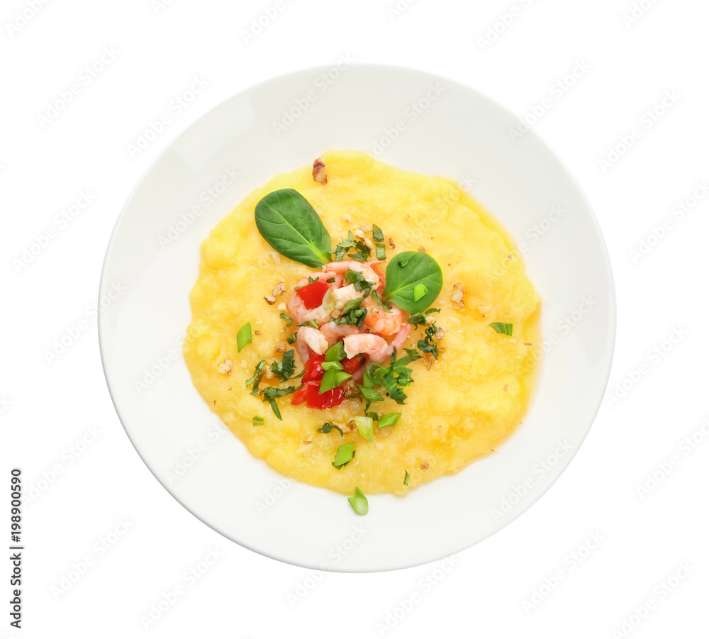 Plate with tasty shrimps and grits on white background, top view
