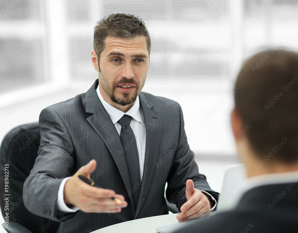 Fototapeta premium closeup.Manager and client discussing the terms of the contract in the office.