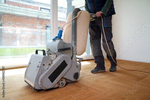 Принти на полотні Sanding parquet with the grinding machine