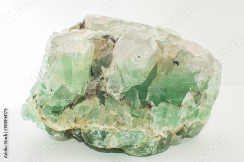 Green gemstone natural mineral fluoride or green beryl isolated
