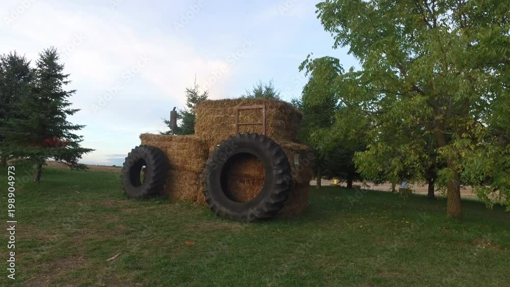 Tractor made from hay bales and tires Tractor made from hay bales and tires