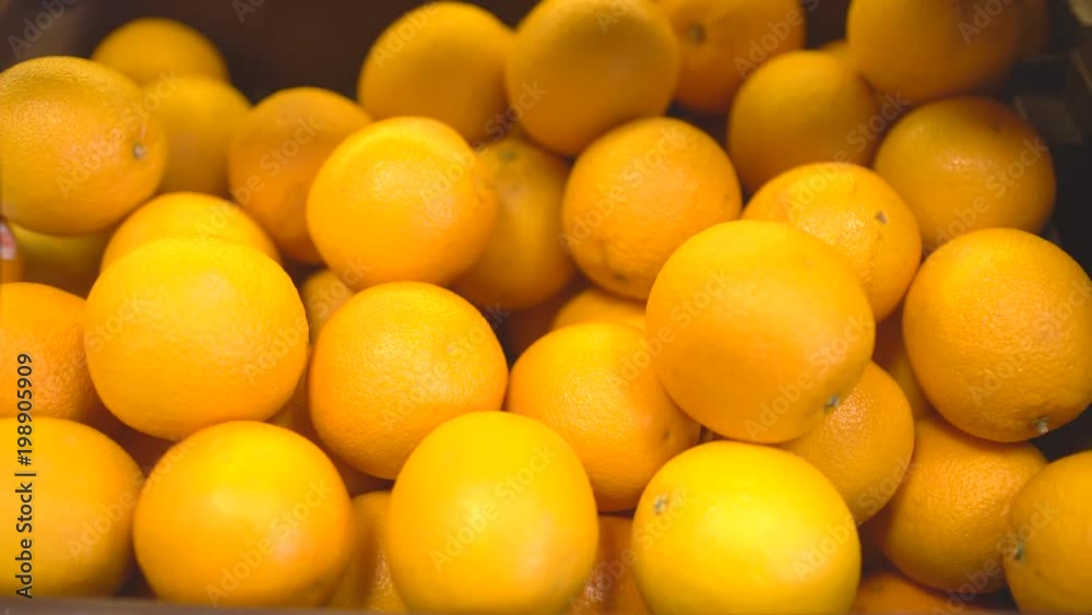 Fresh mandarin or oranges in the store. 4 k Fresh mandarin or oranges in the store. 4 k