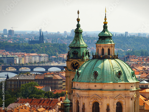 The dome and bell tower of The Church of Saint Nicholas in Prague, Czech Republic