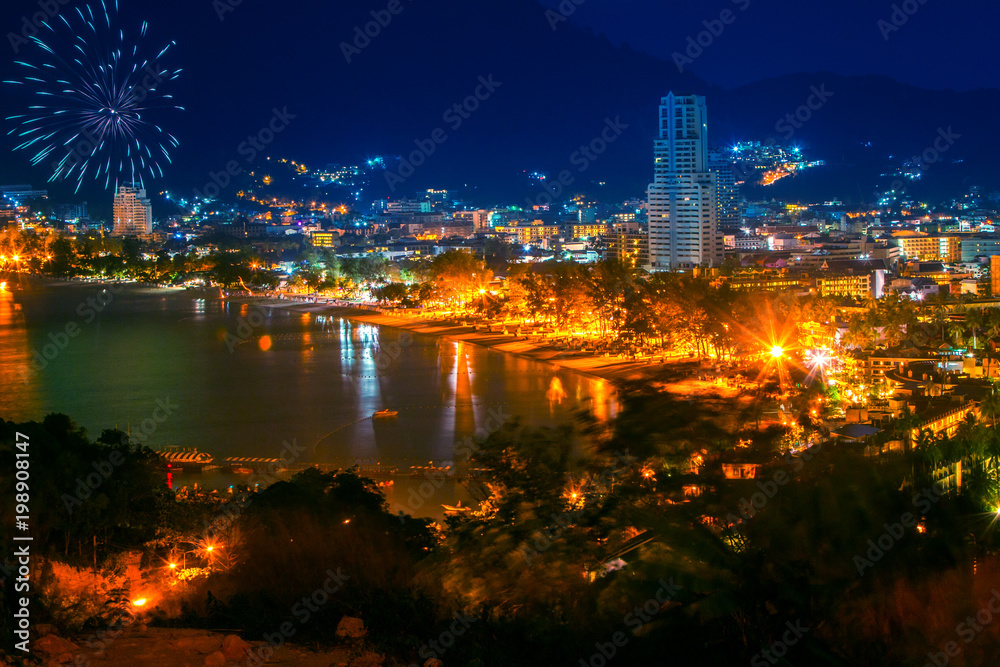 Thailand. the island of Phuket. Night view of Patong beach. Salute above the island of Phuket. Travel to Thailand.
