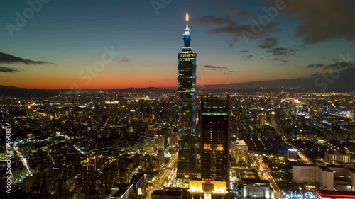 sunset night illuminated taipei tower downtown aerial panorama 4k timelapse taiwan
 photo