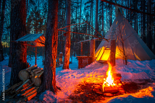 Tipi in the snow-covered fo...