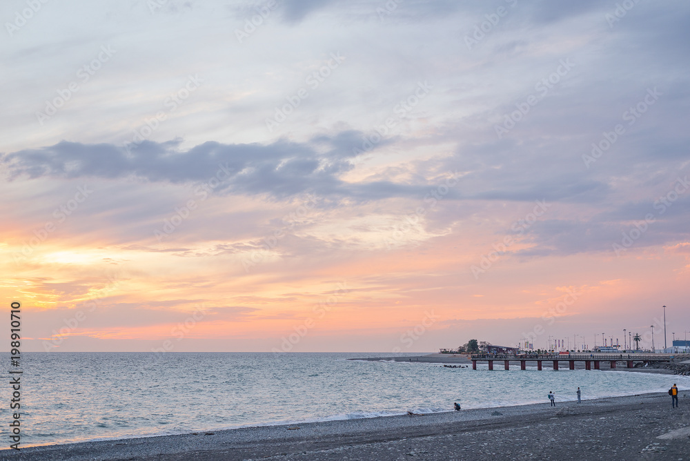 Obraz premium Sunset in the evening on the beach