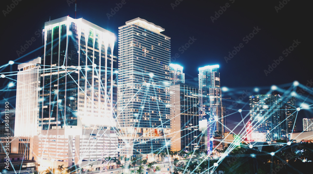 Abstract internet connection network with night city with skyscrapers at the background