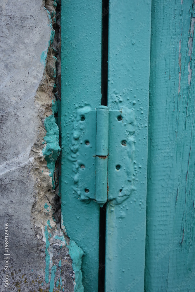 Old plank wooden wall background. The texture of old wood. Weathered piece of wood. Old plank wooden wall background. The texture of old wood. Weathered piece of wood.