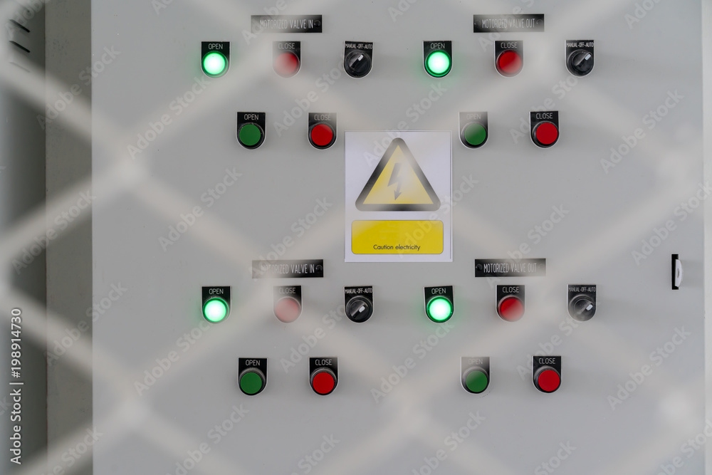 Electric city control panel in grey metal box hanging on wall Electric city control panel in grey metal box hanging on wall