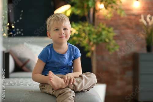 Cute little boy sitting on ...