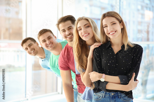 Group of young people indoo...
