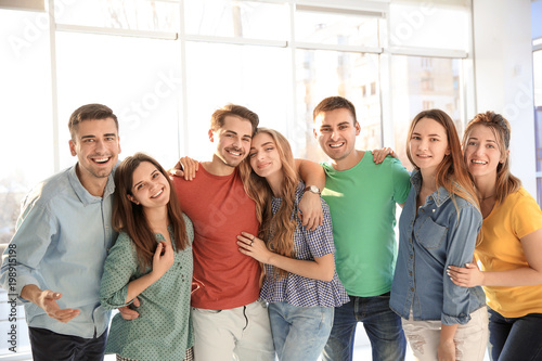 Group of young people indoo...