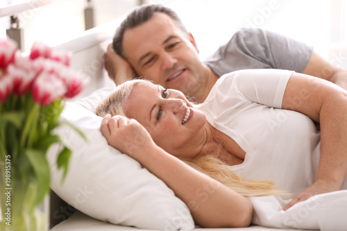 Senior couple in bed togeth...