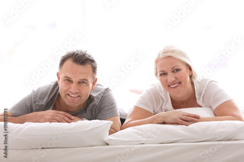 Senior couple in bed togeth...