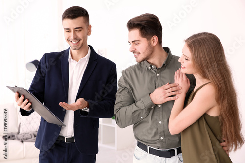 Real estate agent with clie...