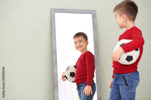 Cute little boy with soccer...