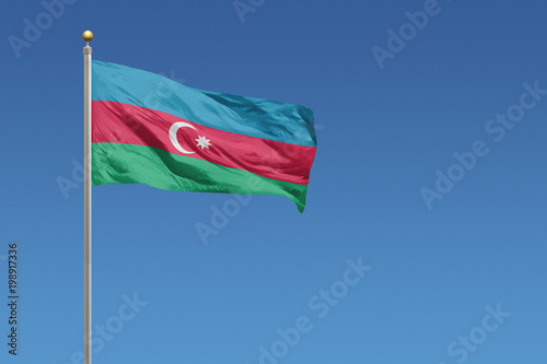 Azerbaijan flag on a clear blue sky day Free Download Azerbaijan flag on a clear blue sky day - GFXLoad