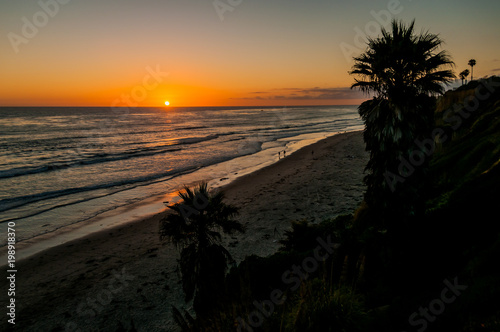 A Walk on the Beach at Sunset