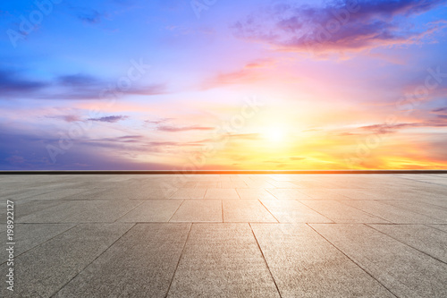 empty square floor and sky clouds at sunset