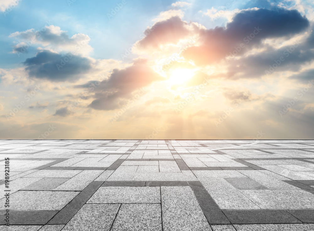 empty square floor and sky clouds at sunset