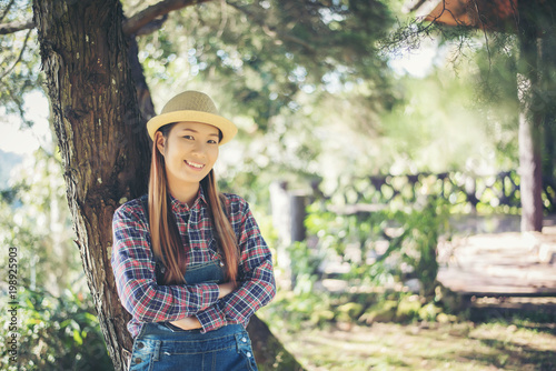 Farmer woman standing at farming