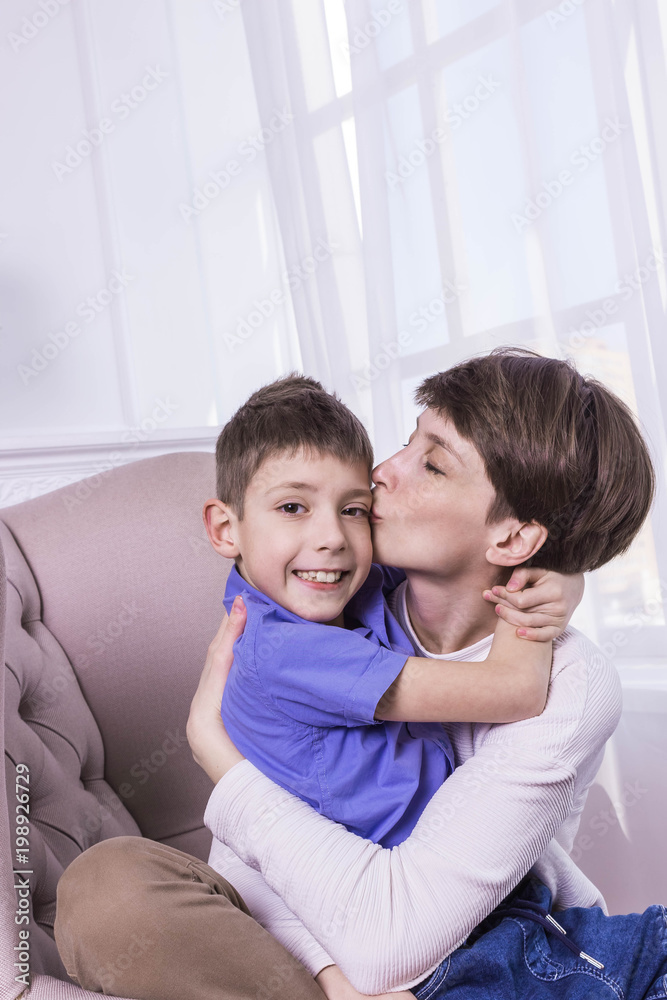 Mother's Day concept: Happy smiling mother and son Mother's Day concept: Happy smiling mother and son