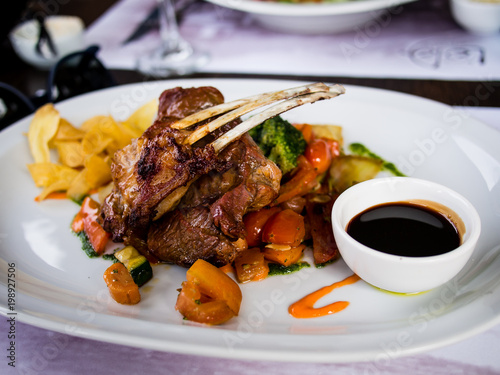 Typical Argentinean lamb chops with vegetables